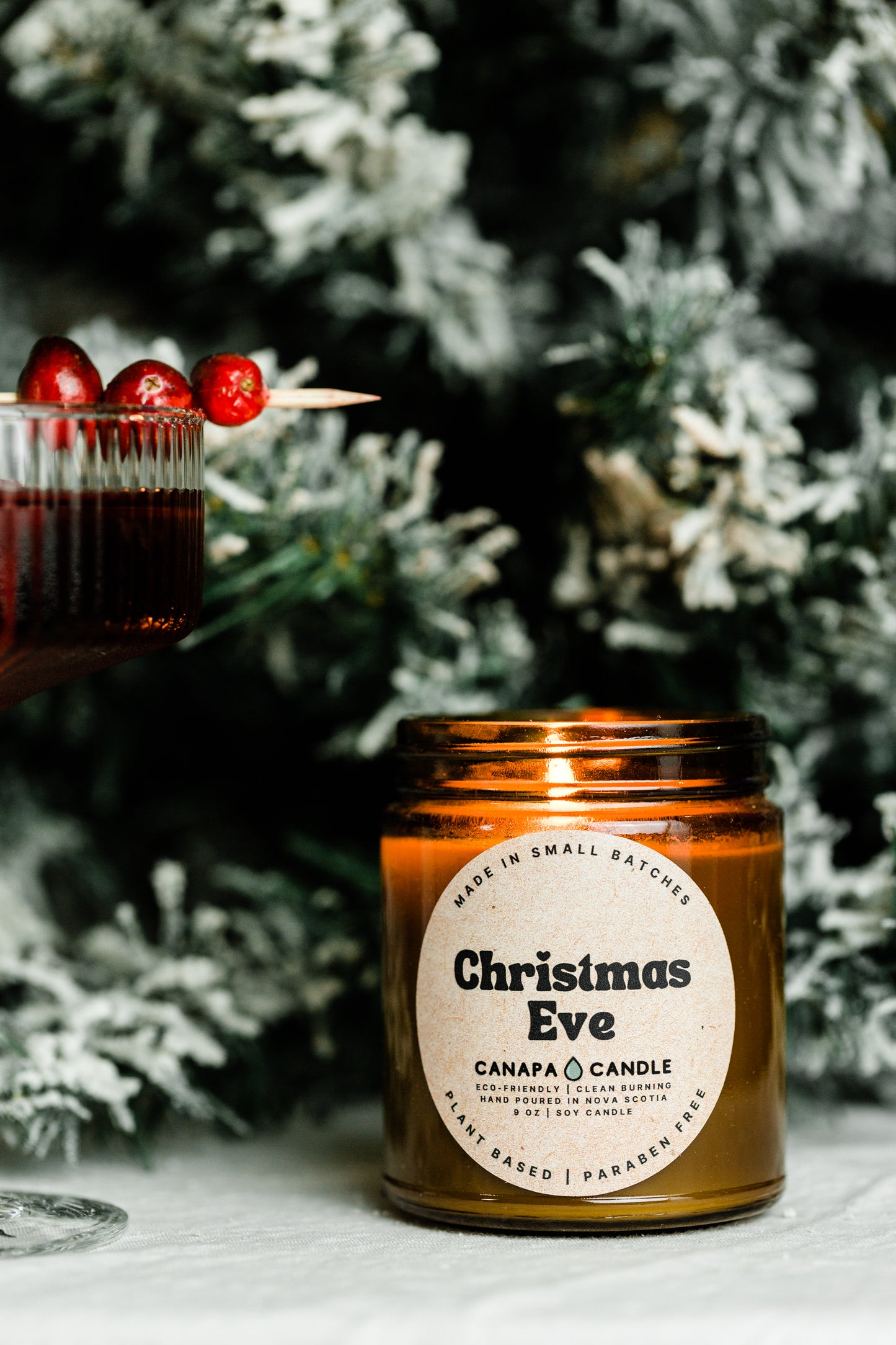 Christmas Eve 9oz Soy Candle made in Canada by Canapa Candle in Louisbourg, Cape Breton Island, Nova Scotia - Vegan, Paraben and Phthalate free - Smells like: Vanilla Cream, Cinnamon, Sugar, Smoke, Sweet Peppermint, Tobacco