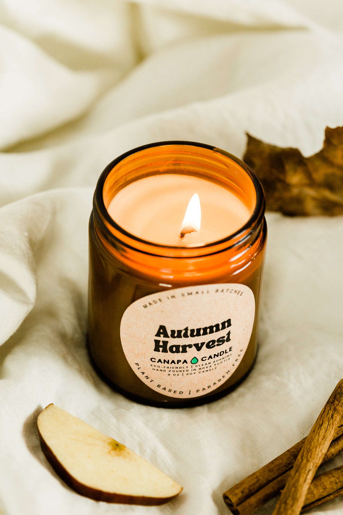 Autumn Harvest 9oz Soy Candle made in Canada by Canapa Candle in Louisbourg, Cape Breton Island, Nova Scotia - Vegan, Paraben and Phthalate free - Smells like: Cranberry, Tart Apple, Cinnamon, Clove, Sugar Edit alt text
